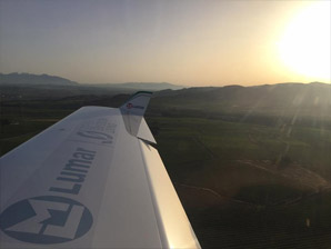 Early morning flight through temperature inversion